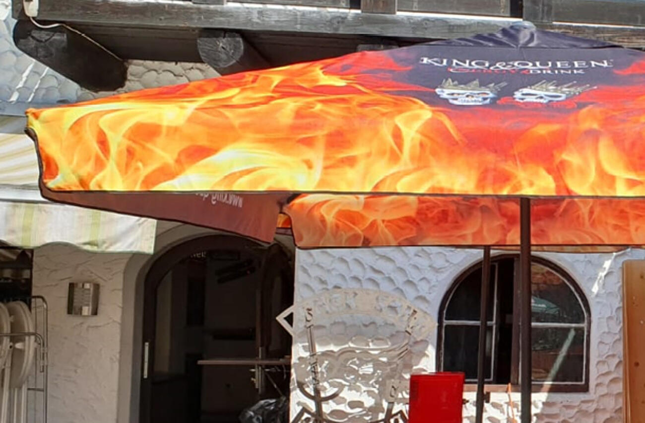 Commercial parasols with all-over printed advertising